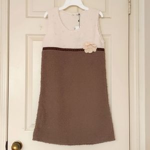 NWT. Girl's Fluffy dress with Pearls and flower.